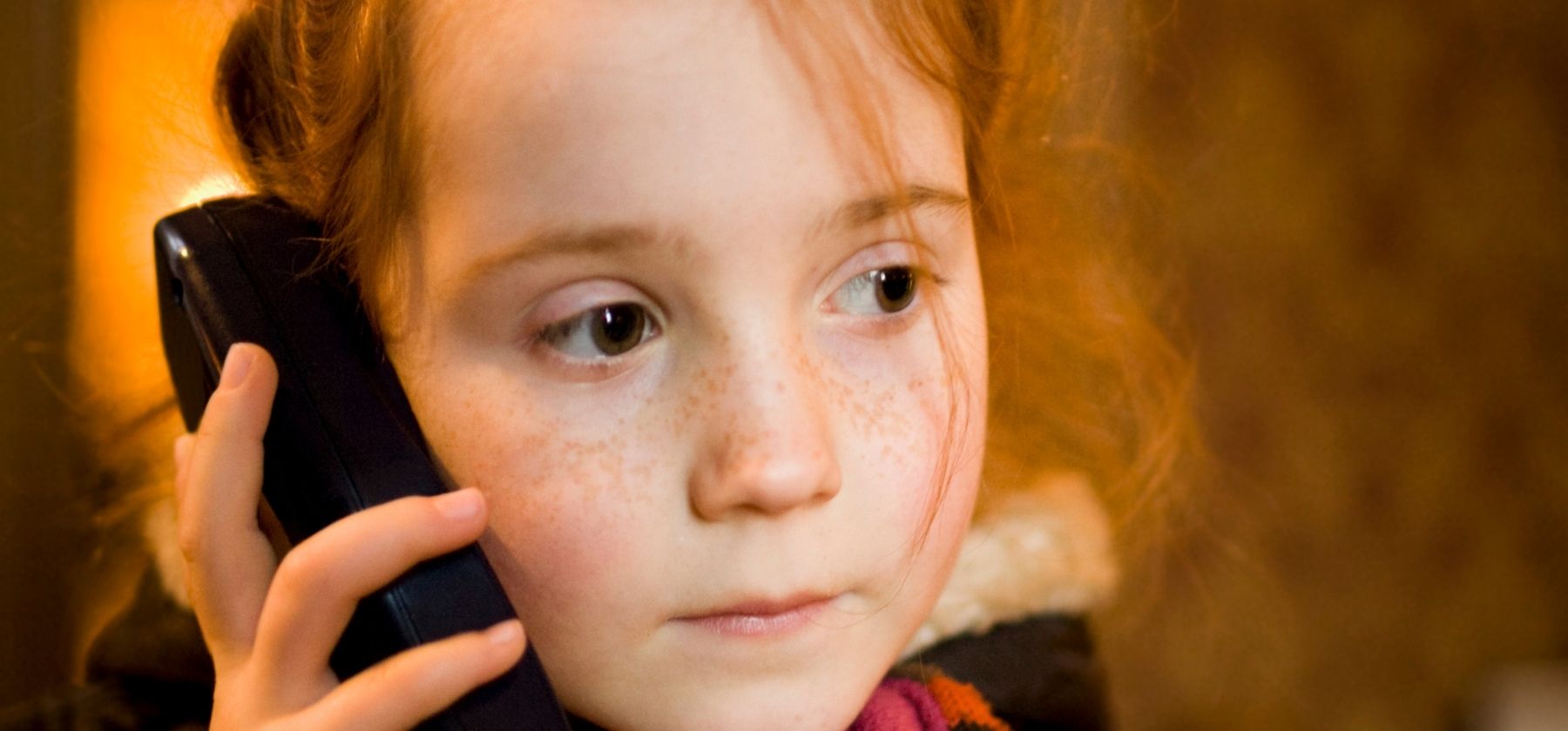 Young girl with audio guide 