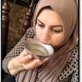 Multaka Volunteer Marriam drinking from her Healing Bowl, a gift from her father