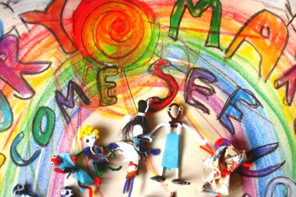 Story Makers artwork featuring a rainbow and many colourful characters