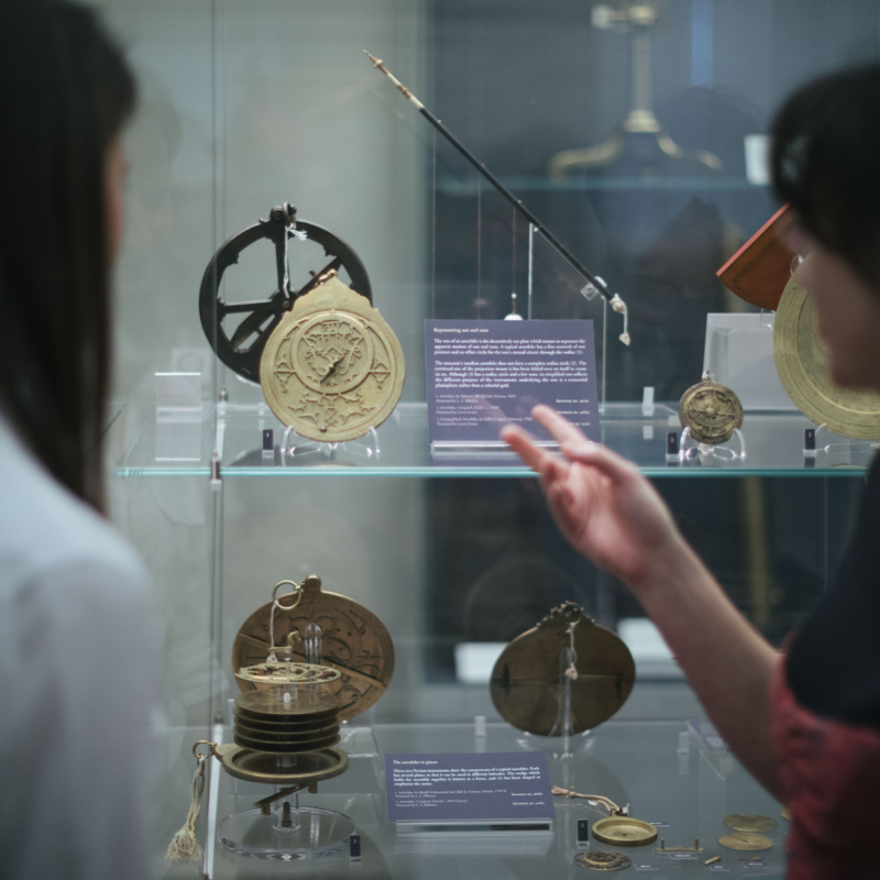 Visitors looking at astrolabes in the Top Gallery Visitors looking at astrolabes in the Top Gallery