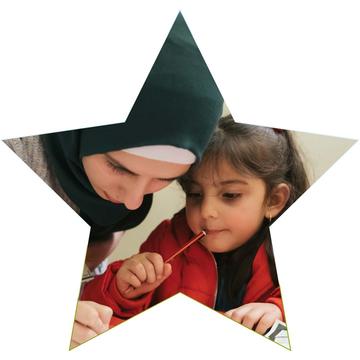 Light Night 2019 - volunteer with young girl (star shape)